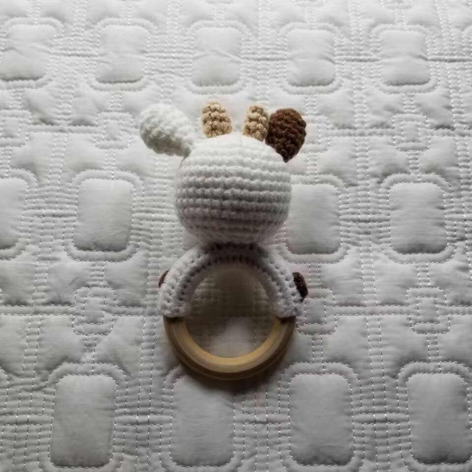 Handmade Baby Rattle Toy โ Cute Cow Design with Organic Cotton & Wood Ring